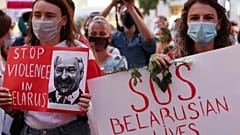 People demonstrate in support of Belarusians after a troubled weekend presidential vote, in Warsaw, Poland, Thursday, Aug. 13, 2020