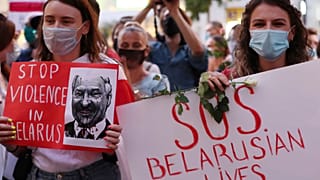People demonstrate in support of Belarusians after a troubled weekend presidential vote, in Warsaw, Poland, Thursday, Aug. 13, 2020