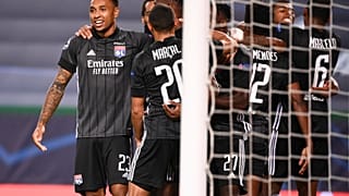 Lyon players celebrate after their third goal during the Champions League quarterfinal match