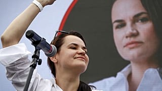 Sunday, July 19, 2020, file photo, Sviatlana Tsikhanouskaya, candidate for the presidential elections, reacts during a meeting with her supporters in Minsk, Belarus.
