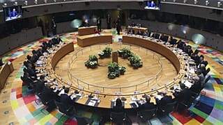 In this Feb. 21, 2020 file photo, European Union leaders meet at a round table during an EU summit in Brussels. 