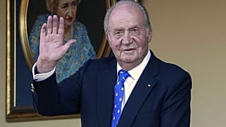 June 2, 2019 file photo, Spain's former King Juan Carlos waves during a bullfight at the bullring in Aranjuez, Madrid, Spain. 