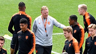 Netherlands coach Ronald Koeman talks to Netherlands' Steven Bergwijn during a training session at their training ground in Braga, Portugal.