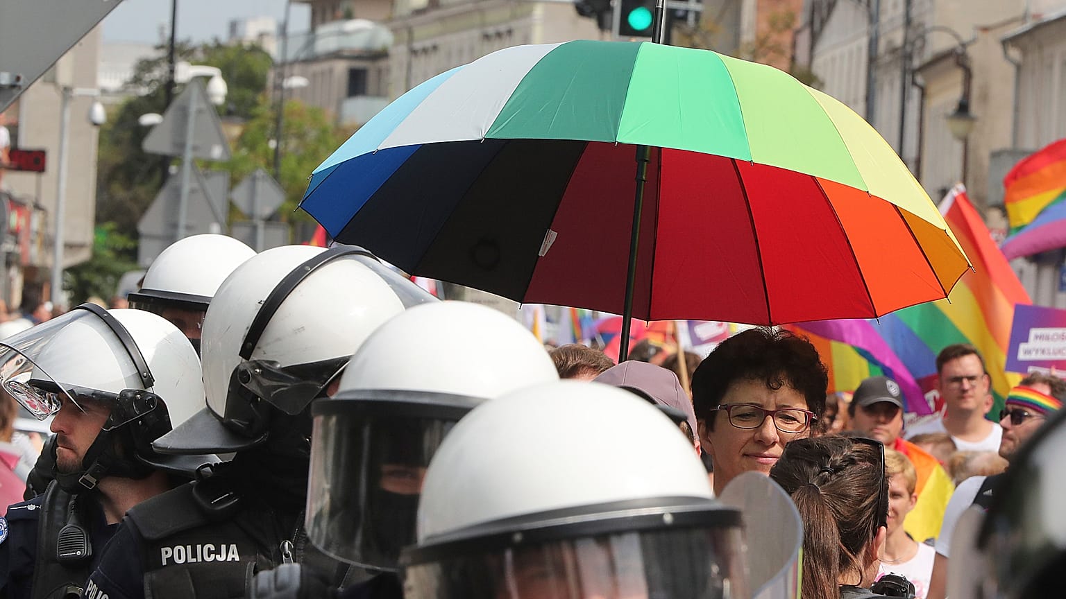 Police escort LGBT activists and their supporters during the first-ever pride parade in the central city of Plock, Poland, on Saturday Aug. 10, 2019. 