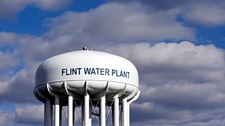 The Flint Water Plant water tower is seen in Flint, Mich. Michigan