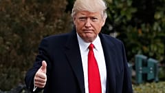 President Donald Trump waves as he walks from White House in Washington, Friday, Feb. 3, 2017