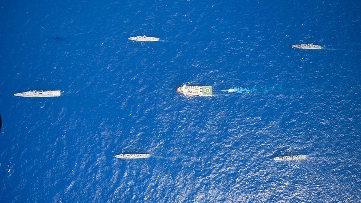 Turkey's research vessel, Oruc Reis, in red and white, is surrounded by Turkish navy vessels as it was heading in the west of Antalya on the Mediterranean