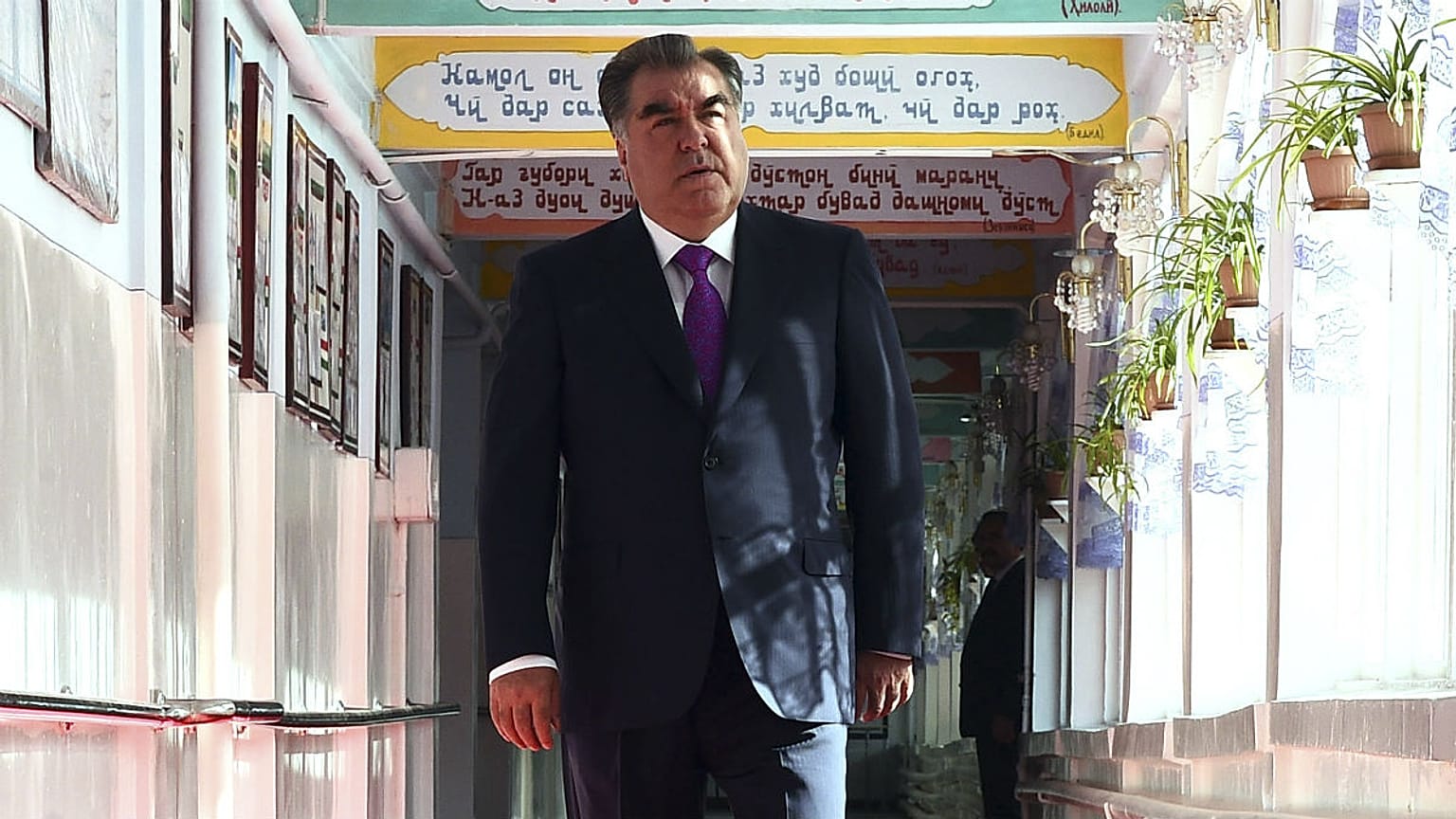 Tajik President Emomali Rakhmon arrives at a polling station in Dushanbe, Tajikistan, Sunday, May 22, 2016