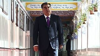 Tajik President Emomali Rakhmon arrives at a polling station in Dushanbe, Tajikistan, Sunday, May 22, 2016