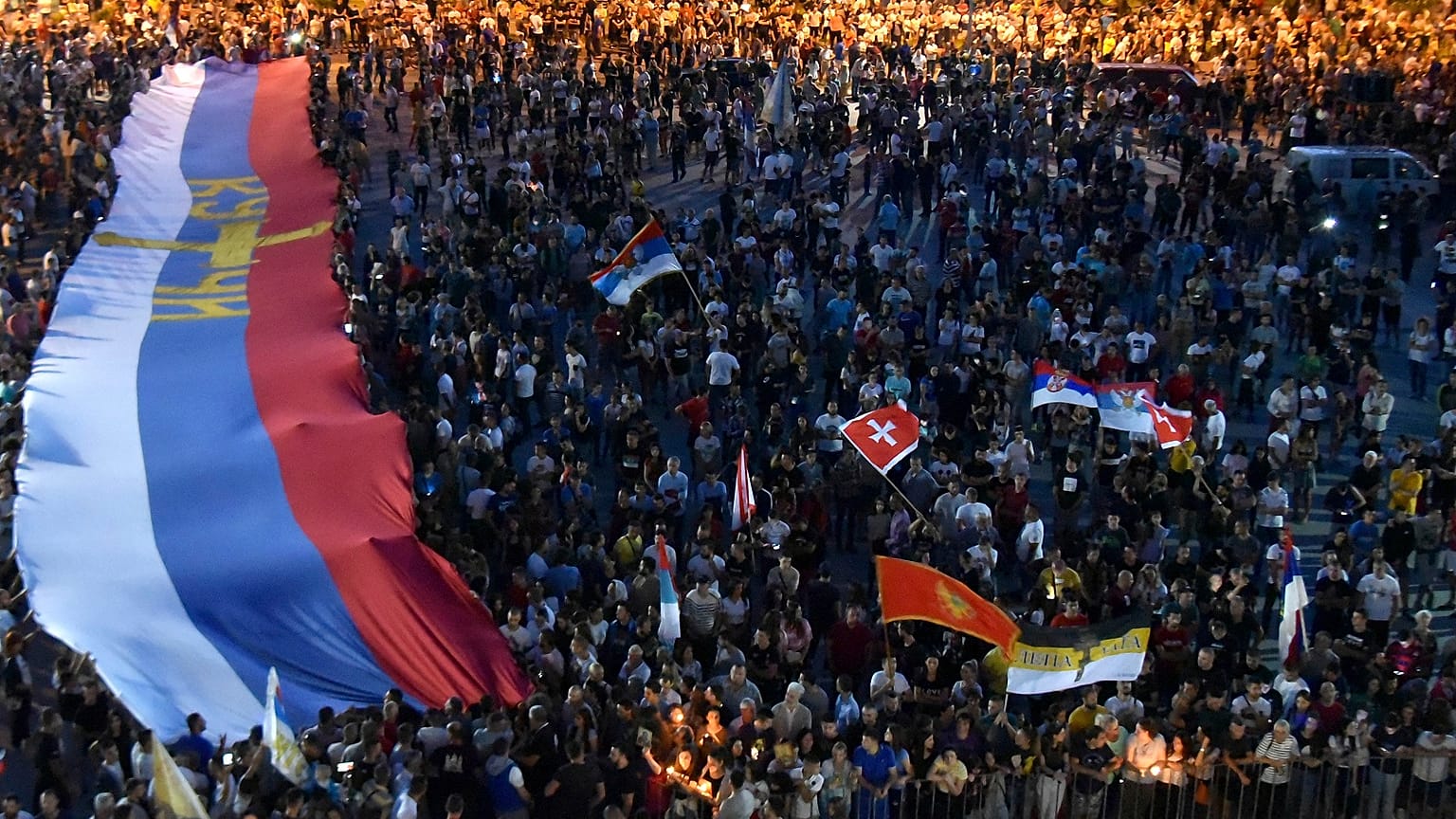 People attend a church-led protest in Podgorica, Montenegro on Sunday, June 14 2020