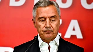 Montenegrin President Milo Djukanovic speaks at his DPS party headquarters in Podgorica, Montenegro, early Monday, August 31