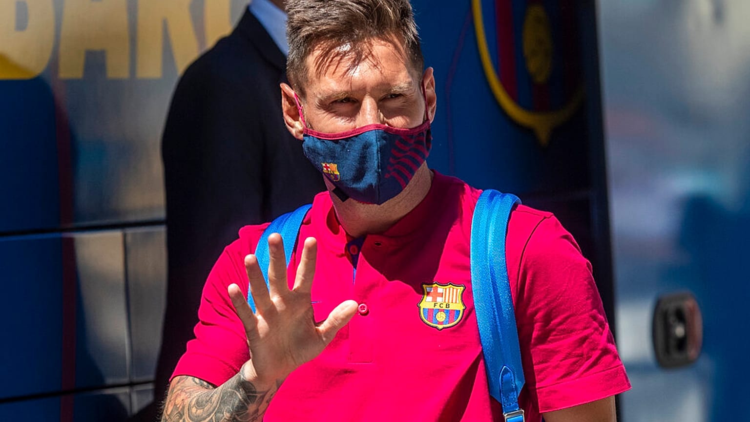  In this Aug. 13, 2020 file photo, Barcelona's Lionel Messi waves as he arrives at the team hotel in Lisbon, Portugal.
