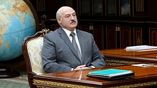 Belarusian President Alexander Lukashenko listens to Valiantsin Sukala, head of the Supreme Court of Belarus during their meeting in Minsk, Belarus, Monday, Aug. 31, 2020.