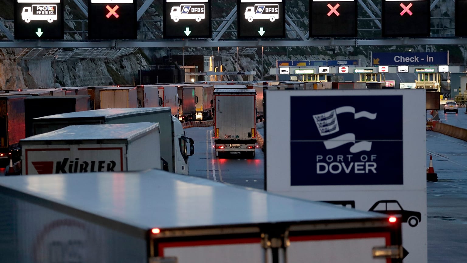 Lorries arrive to board ferries on the morning after Brexit took place at the Port of Dover in Dover, England, Saturday, Feb. 1, 2020. 