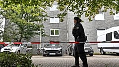 Police secure a house where five dead children were found in Solingen, Germany, Thursday, Sept. 3, 2020.