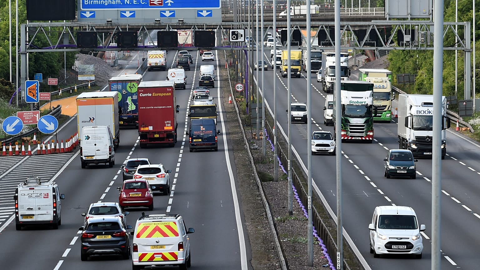 In this file photo dated Monday, May 18, 2020, traffic moves along the M6 motorway near Birmingham, England. 