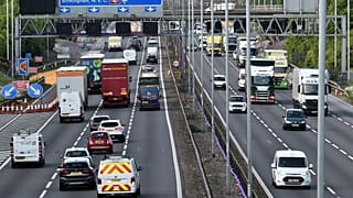 In this file photo dated Monday, May 18, 2020, traffic moves along the M6 motorway near Birmingham, England. 