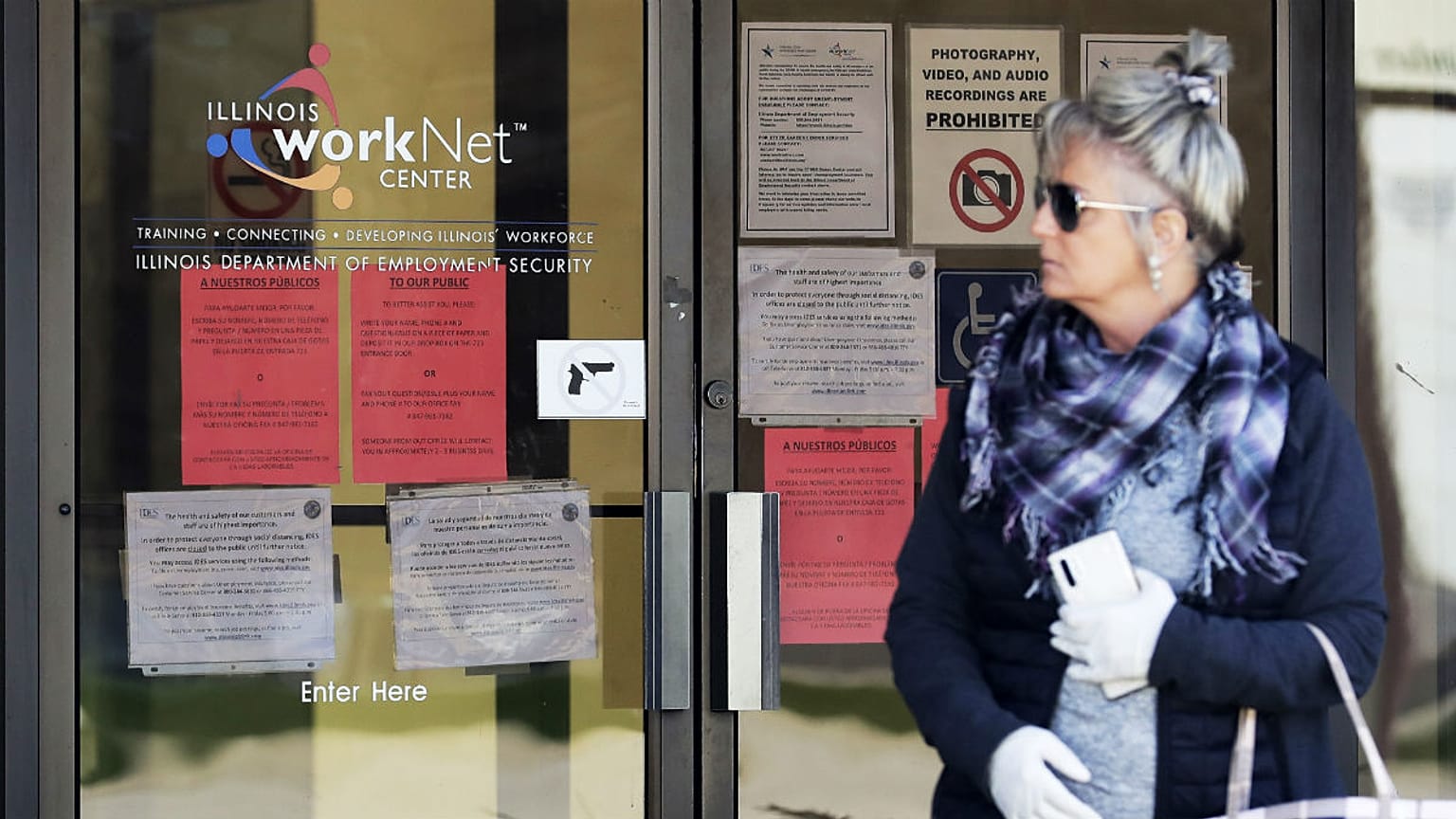 A woman looks to get information about job application
