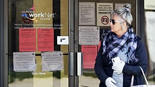 A woman looks to get information about job application