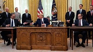 US President Donald Trump with Serbian President Aleksandar Vucic, left, and Kosovar Prime Minister Avdullah Hoti, in the Oval Office of the White House, Sept. 4, 2020.