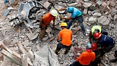 Rescuers search the site of a collapsed building after signals indicated there may be a survivor under the rubble, Beirut, Lebanon. Sept. 4, 2020.