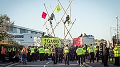 Extinction Rebellion activists create a structure to blockade Newsprinters plant, UK. Septemeber 5, 2020.