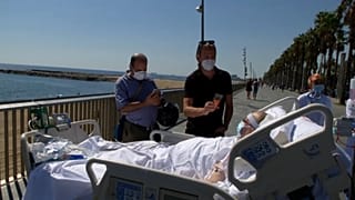After months in ICU, a patient takes in the sea view in Barcelona