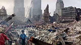 Rescue workers examine the site of the Sept. 11, 2001 World Trade Center terrorist attacks in New York