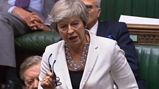 Footage broadcast by the UK Parliament's Parliamentary Recording Unit (PRU) shows former prime minister Theresa May in the House of Commons in London on October 19, 2019.