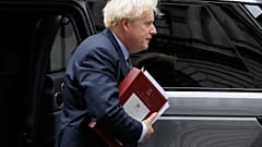 Britain's Prime Minister Boris Johnson returns to Downing Street after attending the weekly session of Prime Ministers Questions in Parliament in London. Sept. 9, 2020.