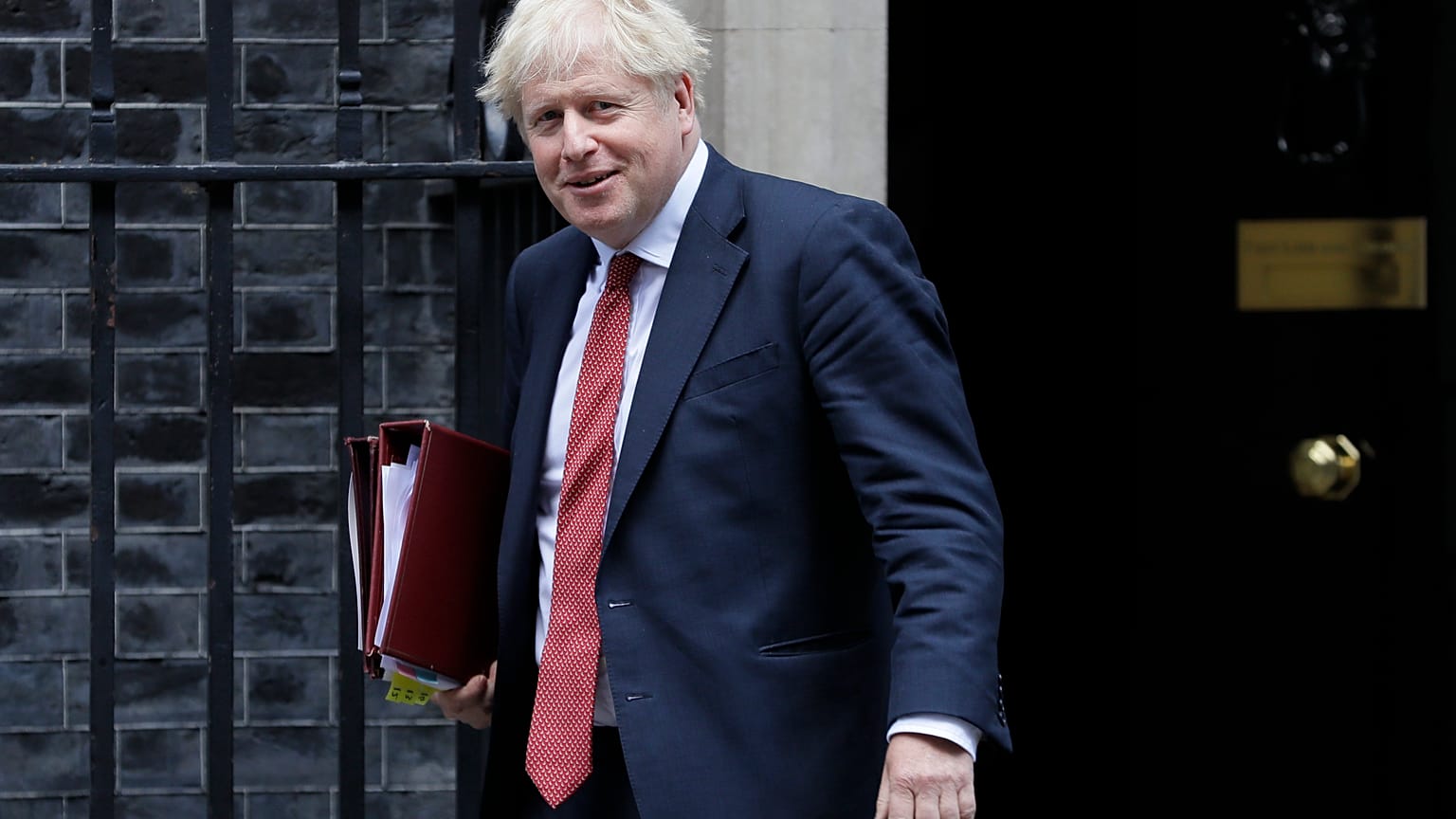 Britain's Prime Minister Boris Johnson leaves Downing Street in London, Wednesday, Sept. 2, 2020.