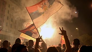 Pro-opposition supporters celebrate the election results in Podgorica, Montenegro, early in the morning on August 31, 2020.
