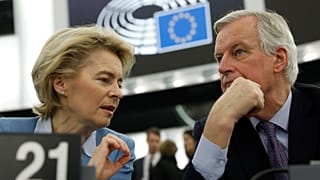 European Commission President Ursula von der Leyen, left, talks to to European Union chief Brexit negotiator Michel Barnier