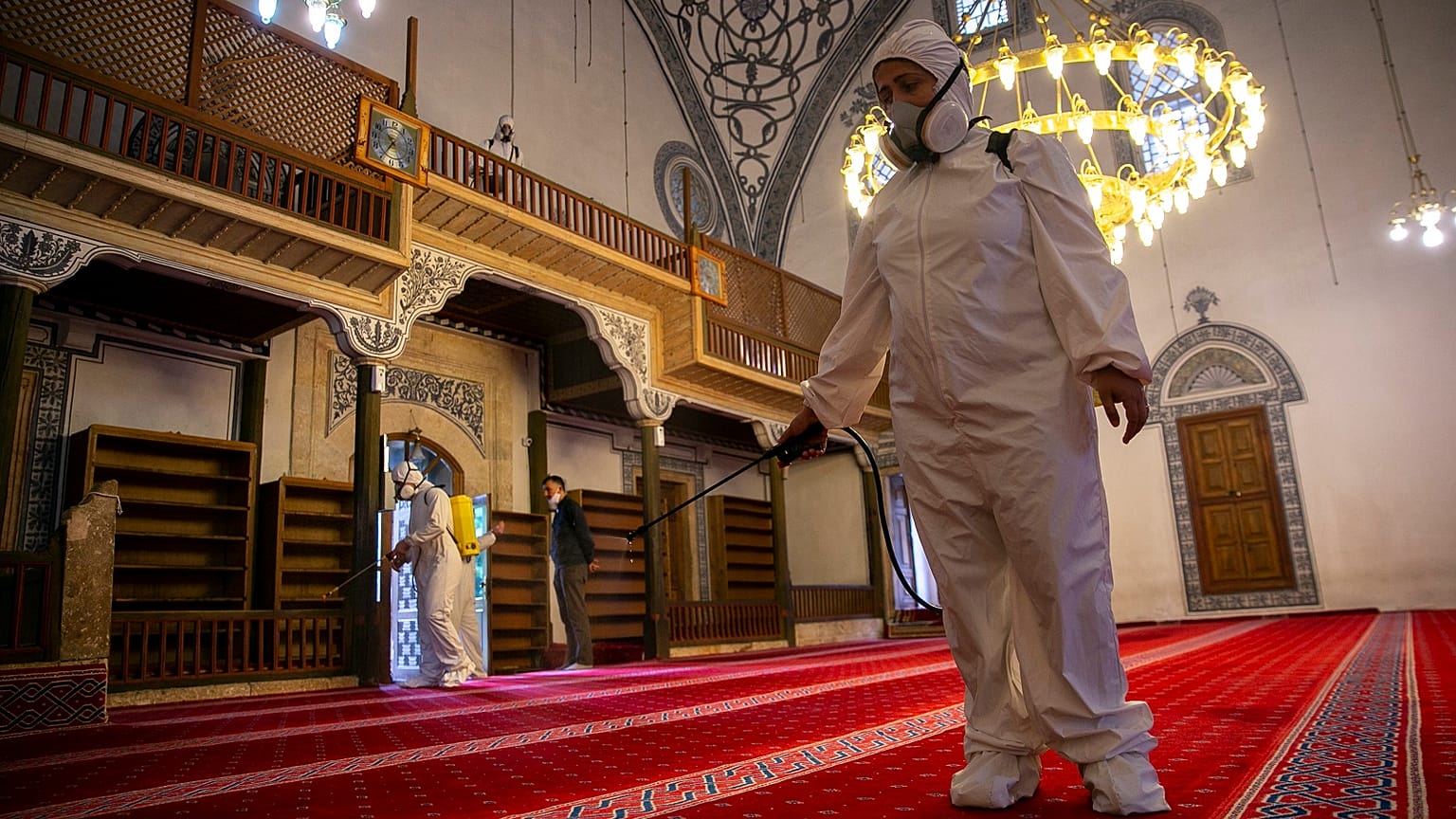 Disinfection team disinfect the premises of the grand mosque in capital Pristina, Kosovo.