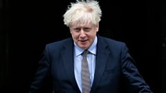 FILE - In this Wednesday, Sept. 9, 2020 file photo, Britain's Prime Minister Boris Johnson leaves Downing Street to attend the weekly session of Prime Ministers Questions.