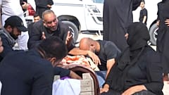 عراقيون يعيدون دفن ضحايا كورونا بمقابر عائلية