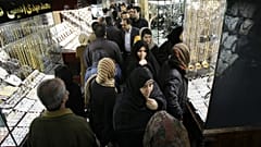 Iranians walk at the gold market of Tehran's old main bazaar, Iran