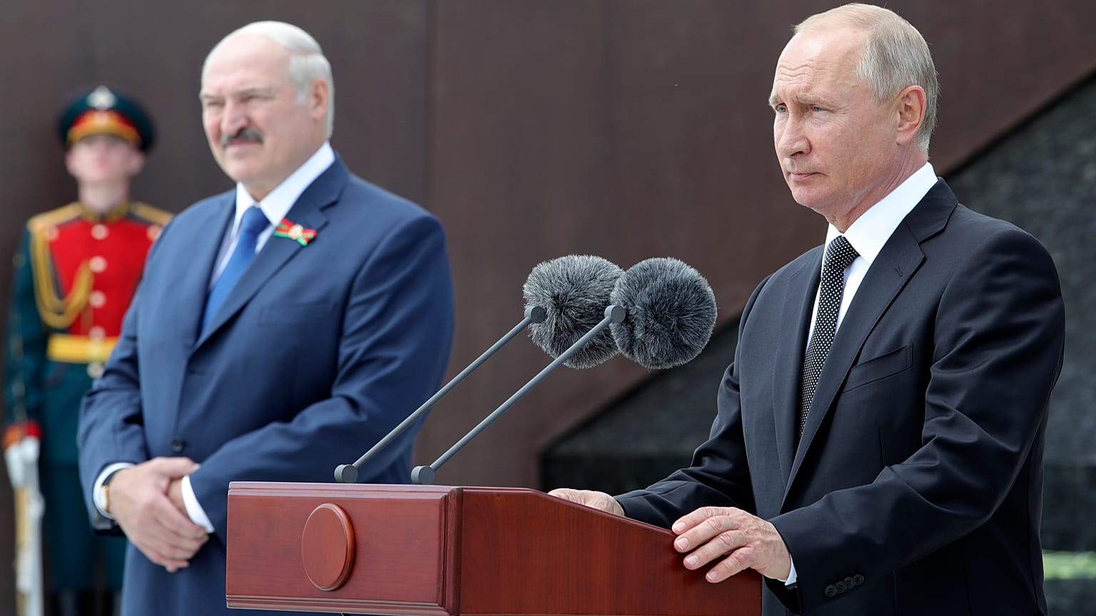 Russian President Vladimir Putin, right, and Belarusian President Alexander Lukashenko at public ceremony, in the village of Khoroshevo, Russia, 30, 2020