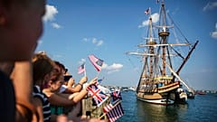 In this Aug. 10, 2020 file photo the Mayflower II, a replica of the original Mayflower ship that brought the Pilgrims to America 400 year ago, sails into Plymouth, Mass.