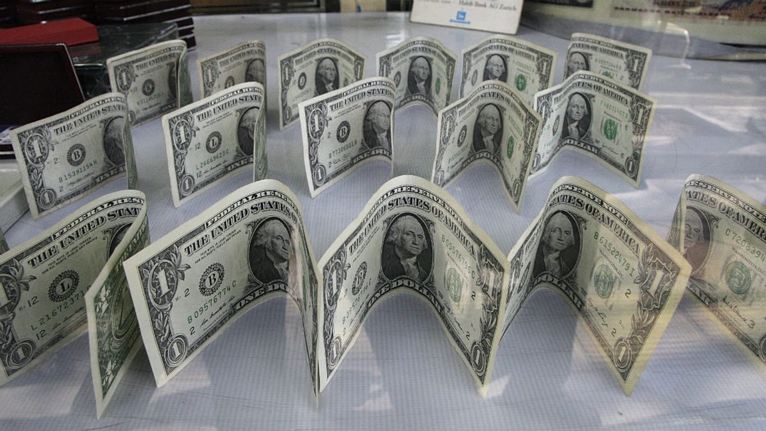 US dollars decorate a foreign currency exchange bureau, in Ferdowsi St. in downtown Tehran, Iran