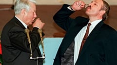 Boris Yeltsin, left, and Belarusian President Alexander Lukashenko drink vodka after a toast celebrating the signing of an agreement in the Kremlin in Moscow. 2 April 1996