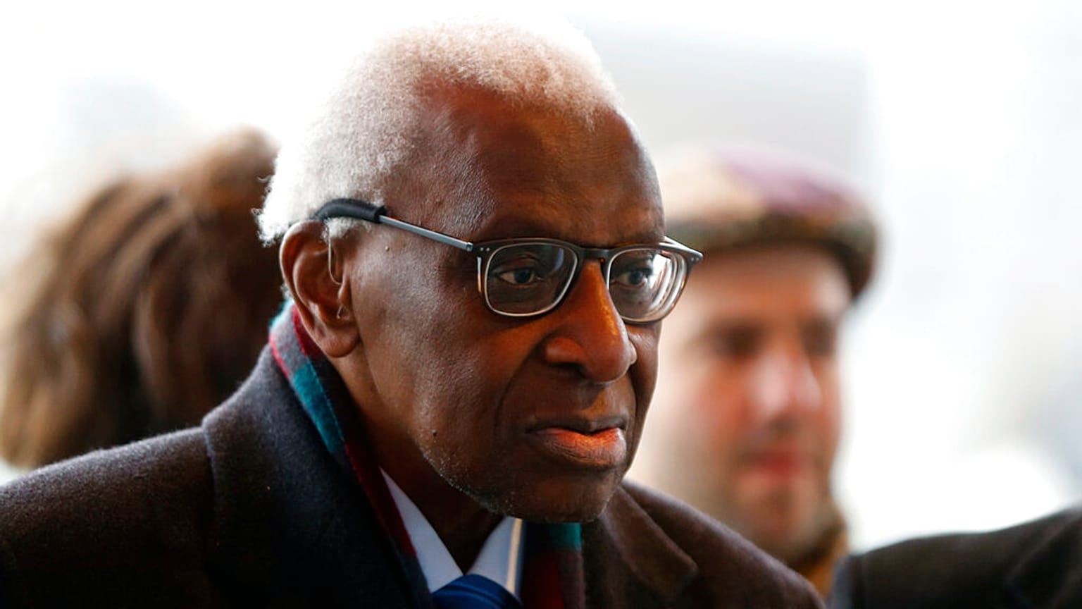  Iin this Jan.13, 2020 file photo, former president of the IAAF (International Association of Athletics Federations) Lamine Diack arrives at the Paris courthouse, Monday, Jan.