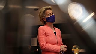 European Commission President Ursula von der Leyen speaks with the media in the hallway at the European Parliament in Brussels, Wednesday, Sept. 16, 2020.