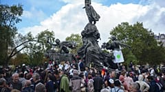 Demonstrators gather during an anti-mask demonstration in Paris