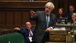Britain's Prime Minister Boris Johnson speaks during Prime Minister's Questions in the House of Commons in London, Wednesday, Sept. 16, 2020. 