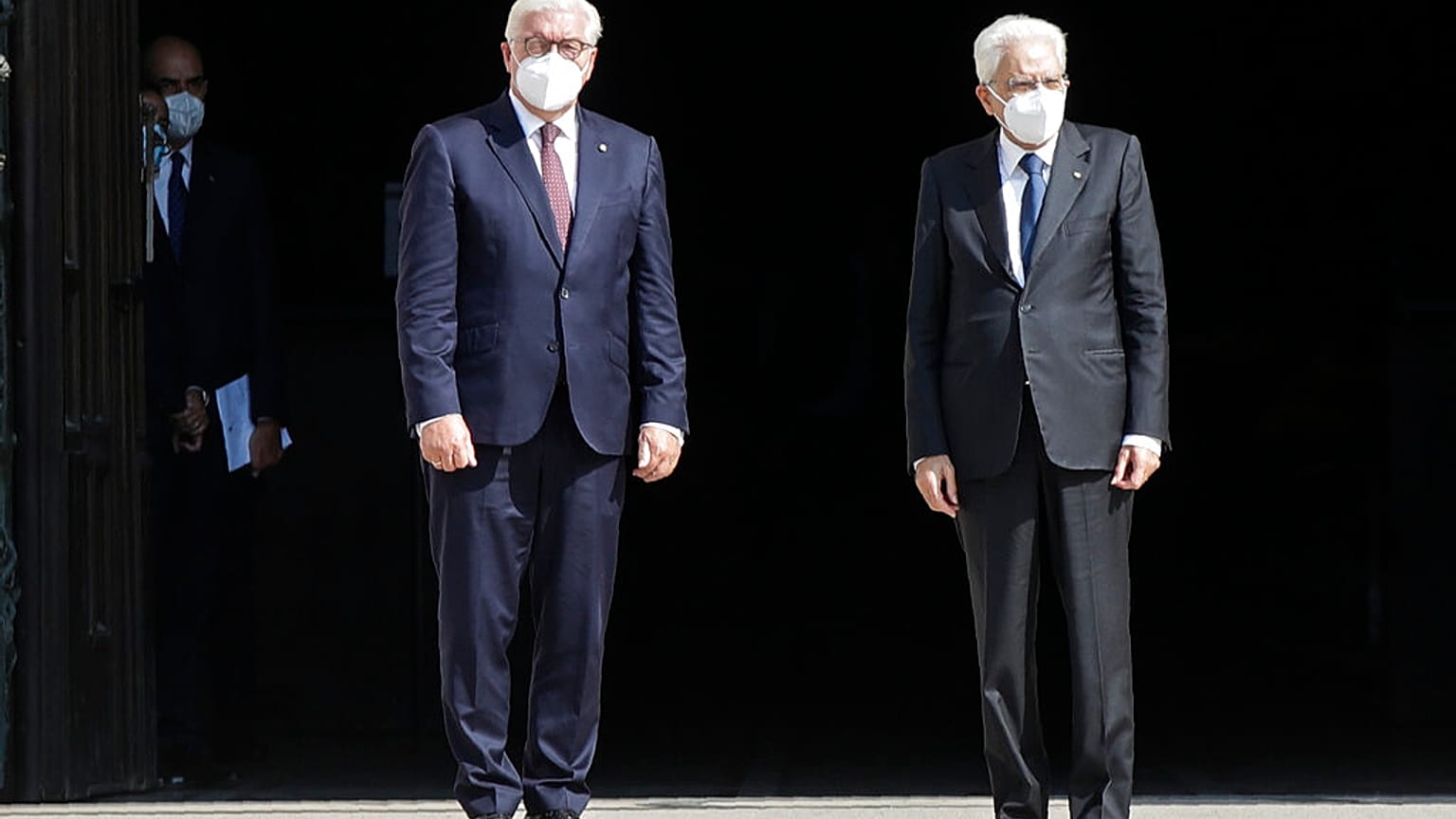 German President Frank-Walter Steinmeier, is flanked by Italian President Sergio Mattarella after visiting the Duomo gothic cathedral, in Milan, Italy, Sept. 17, 2020