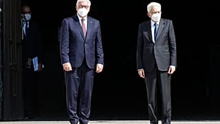 German President Frank-Walter Steinmeier, is flanked by Italian President Sergio Mattarella after visiting the Duomo gothic cathedral, in Milan, Italy, Sept. 17, 2020