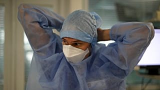 A nurse in a COVID-19 area in a Marseille hospital, southern France, Thursday, Sept.10, 2020.