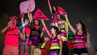 Protesters chanted slogans and held banners against Israeli Prime Minister Benjamin Netanyahu and the coronavirus countrywide lockdown in Tel Aviv on Thursday