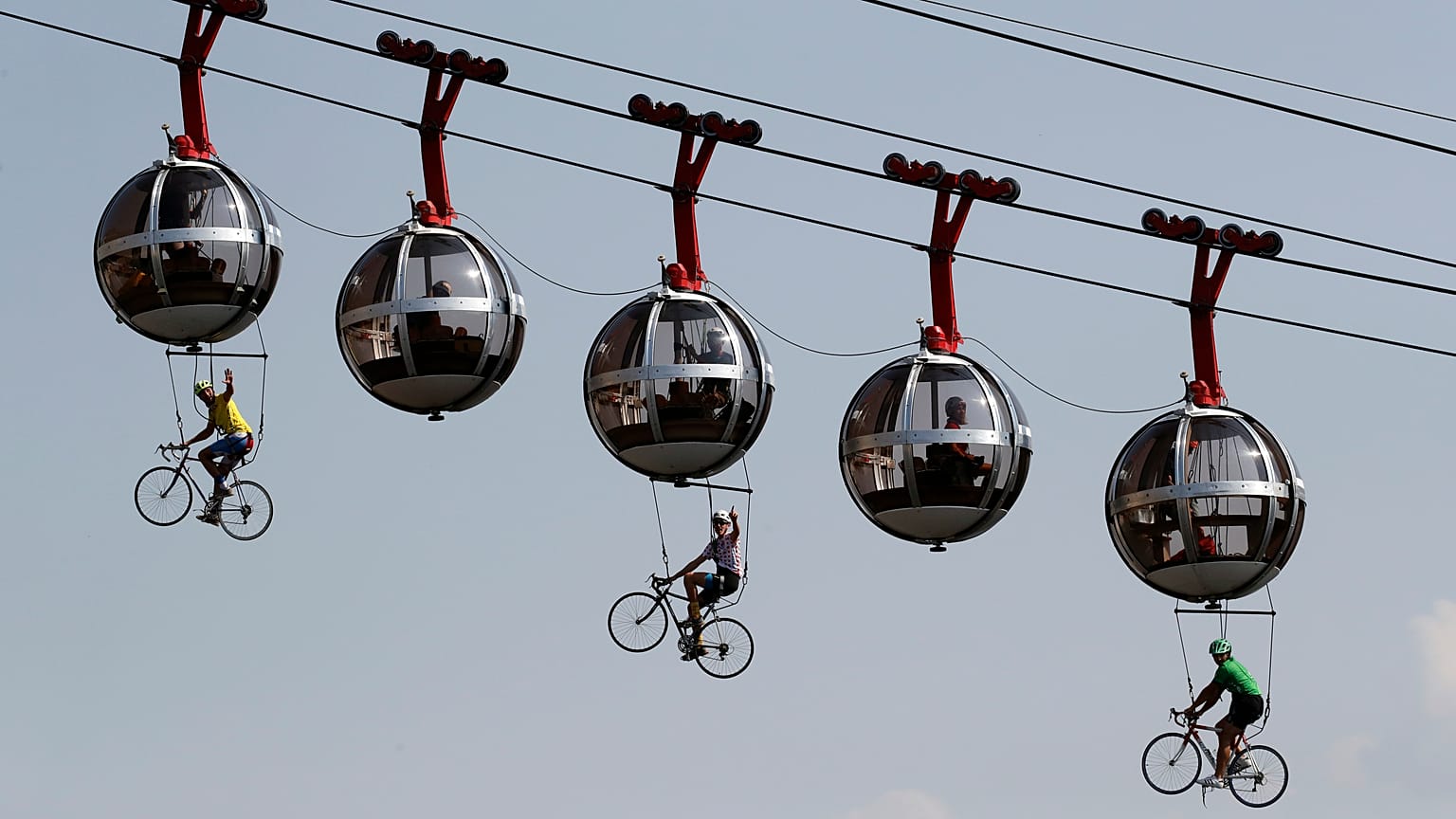 Performers dressed as riders pedal during the start of stage 17 of the Tour de France cycling race over 170 kilometres, starting in Grenoble. September 16, 2020